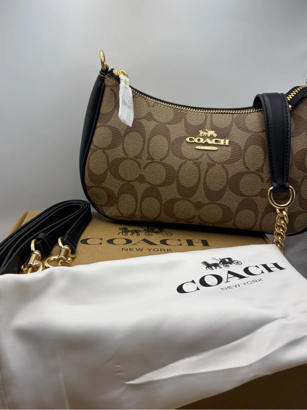Coach Brown Signature Canvas Shoulder Bag with Black Trim and Gold Hardware